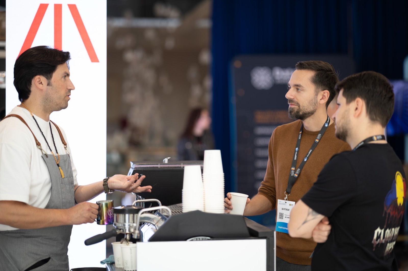 Conversations at the Metaminds stand — Cloud Native Days Romania 2026, Bucharest